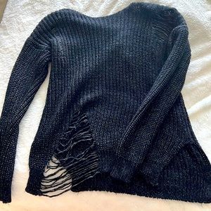 Distressed women’s sweater